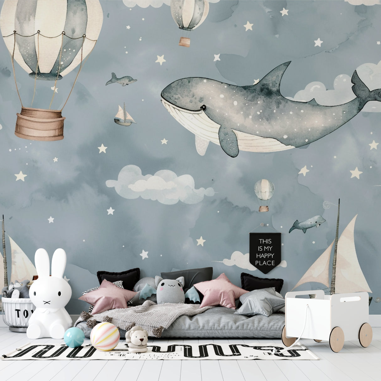 Kids bedroom with Whale Adventure wallpaper showing playful hot air balloons and gentle marine theme