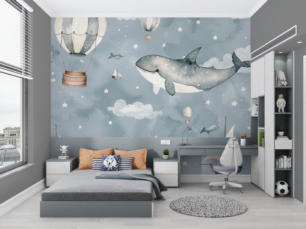 Nursery room featuring dreamy whale wallpaper with floating balloons in soft blues