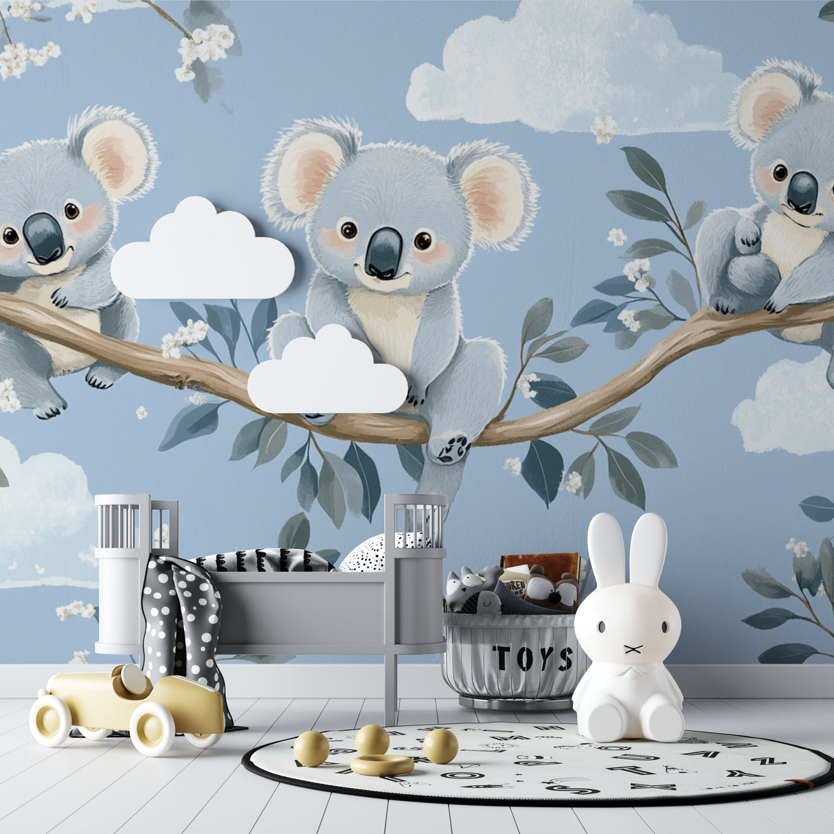 Blue koala wall mural creating a peaceful atmosphere in a baby's room