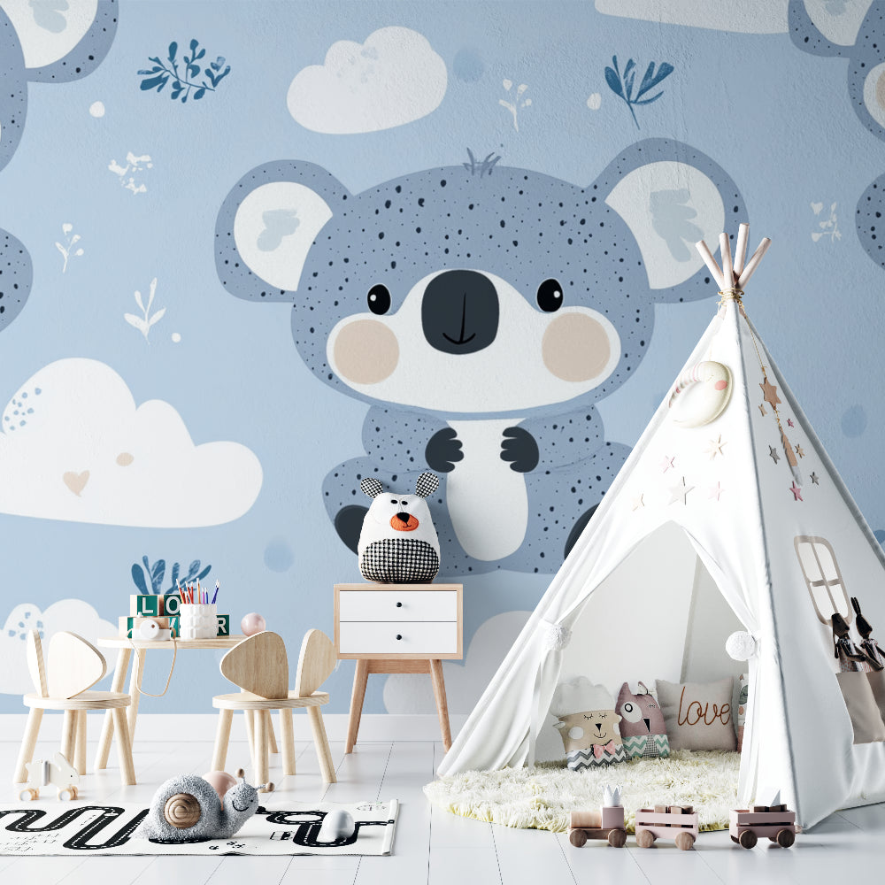 Baby room with koala wallpaper showing crib and matching decor