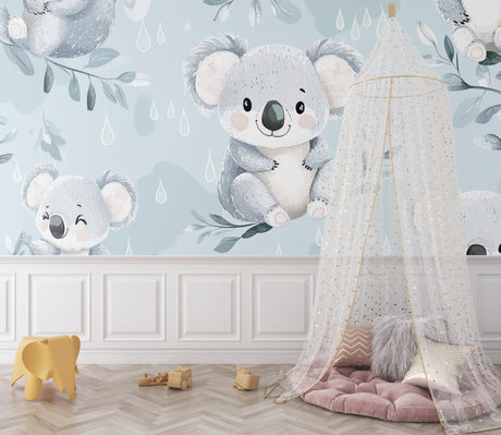 Koala nursery wallpaper in a modern baby room with white furniture and soft lighting