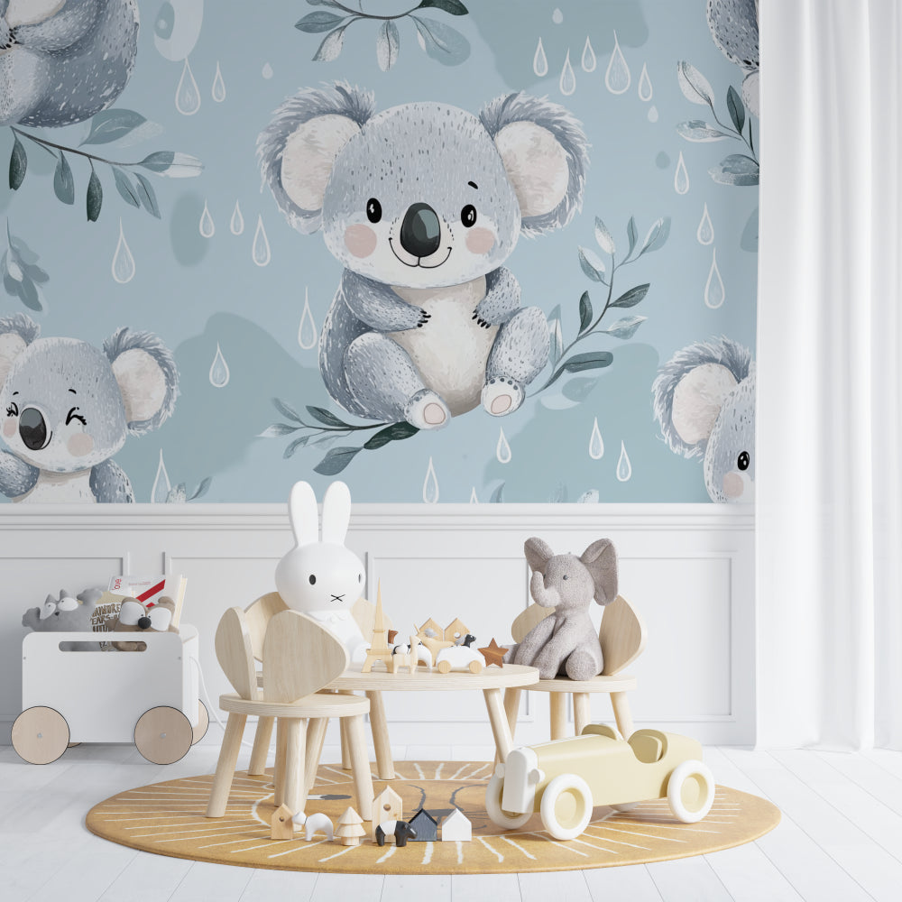 Baby room with koala wall mural featuring rain drops, crib and rocking chair