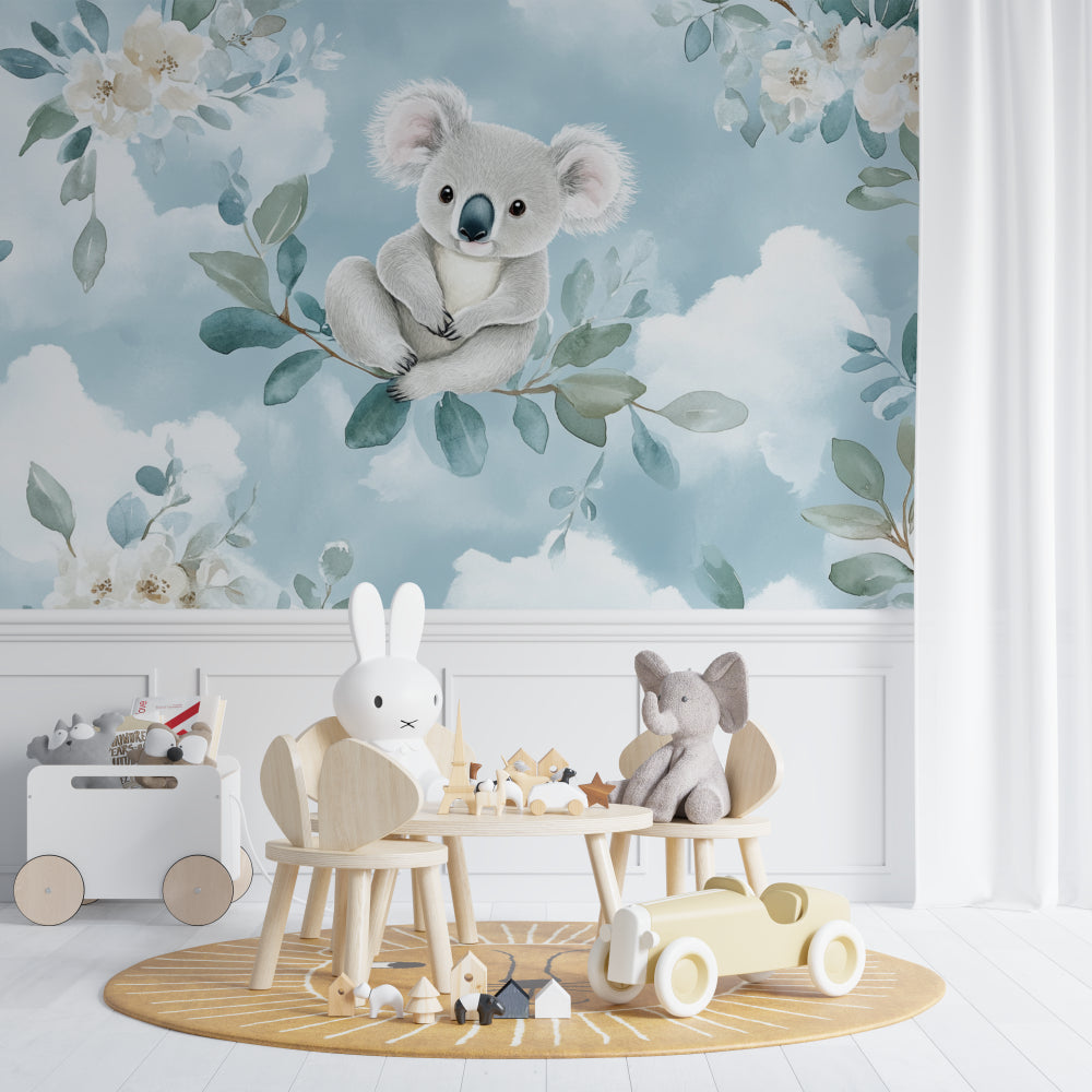 Dreamy koala wallpaper brightening up a peaceful nursery with soft furnishings