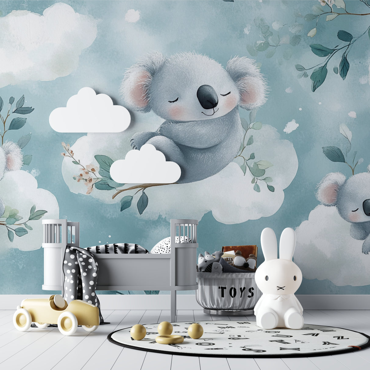 Koala nursery wallpaper in a modern white nursery with natural wood furniture