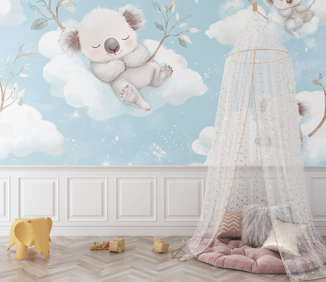 Koala nursery wallpaper creating a peaceful atmosphere in a modern nursery with white furniture