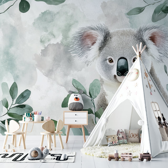 Koala wallpaper mural creating a peaceful atmosphere in a modern nursery with neutral furniture