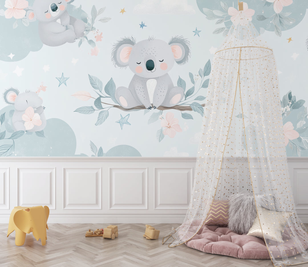 Dreamy koala mural displayed in nursery with rocking chair and mobile