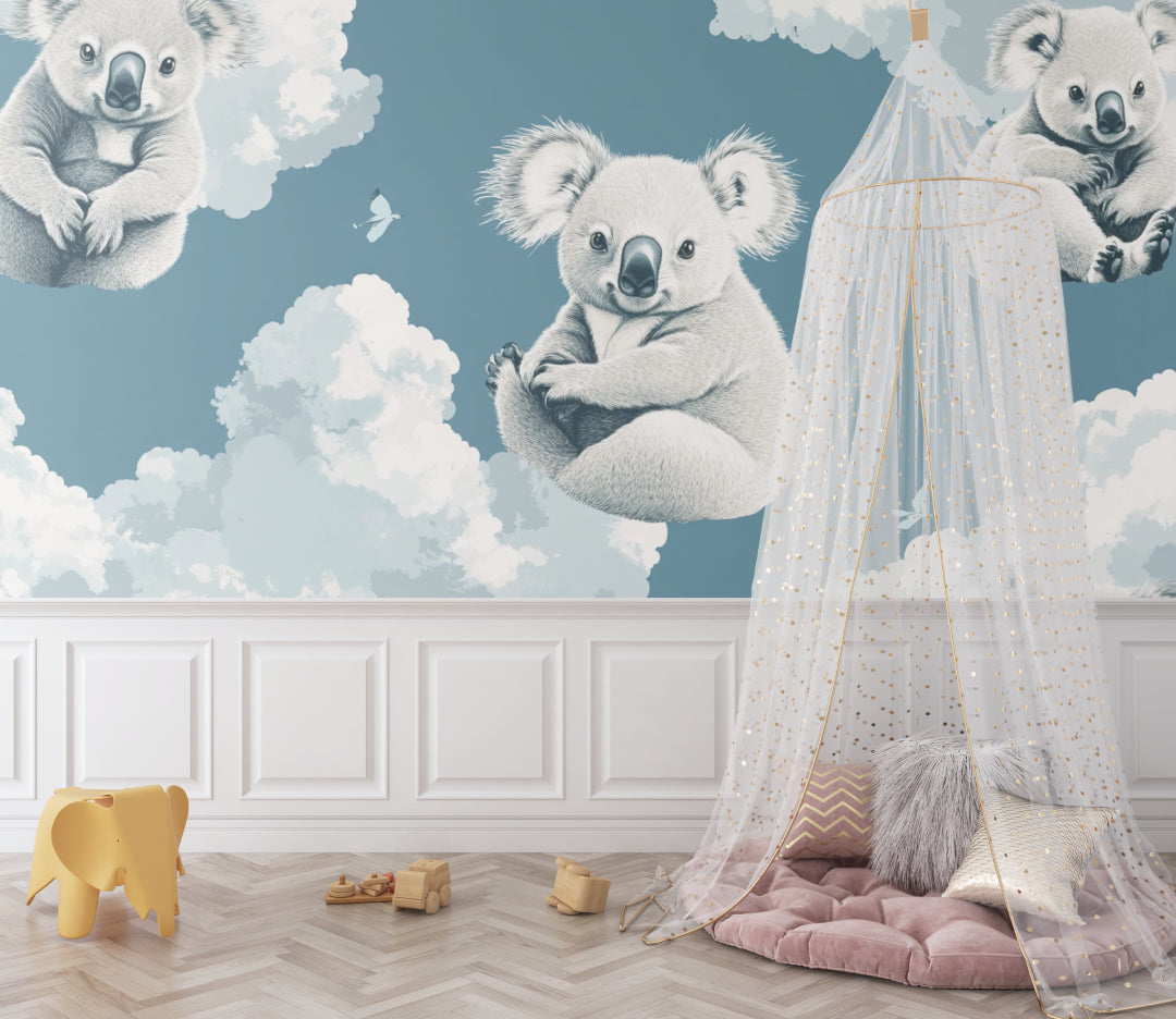Koala nursery wallpaper creating a peaceful atmosphere in a modern nursery with white furniture