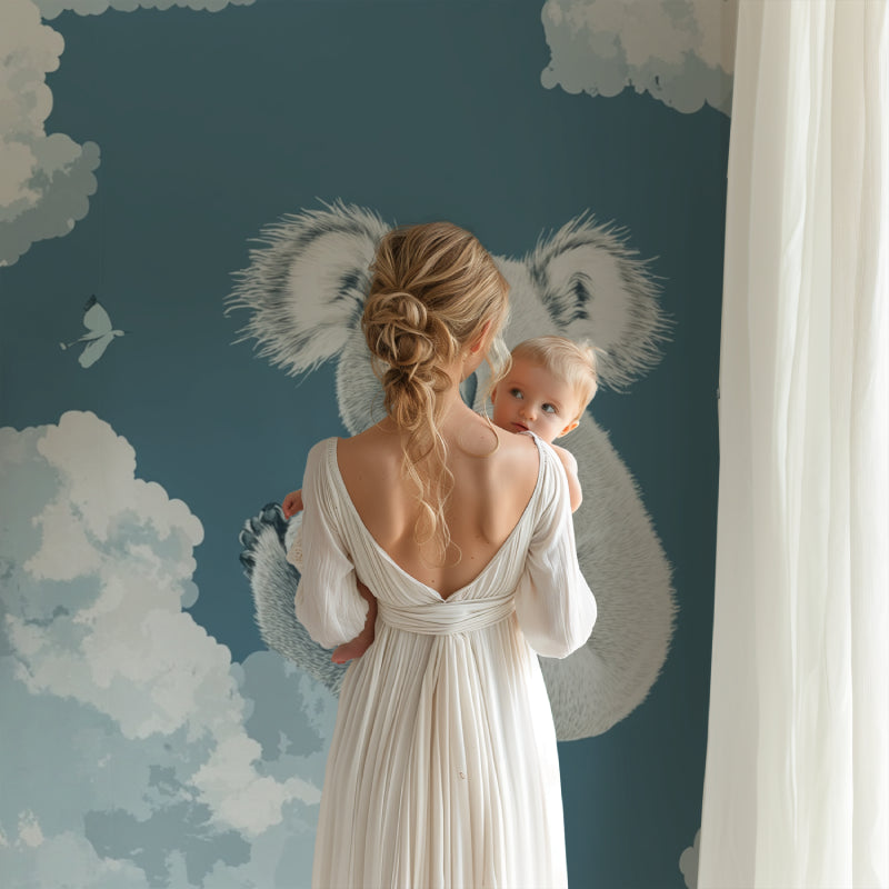 Baby room showcasing floating koalas and cloud pattern wall mural