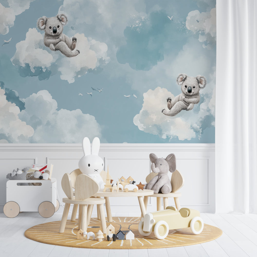 Koala nursery wallpaper creating a peaceful atmosphere in a modern nursery with white furniture