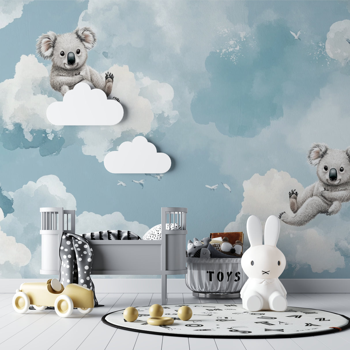 Cloud nursery wallpaper with koalas brightening a toddler's bedroom