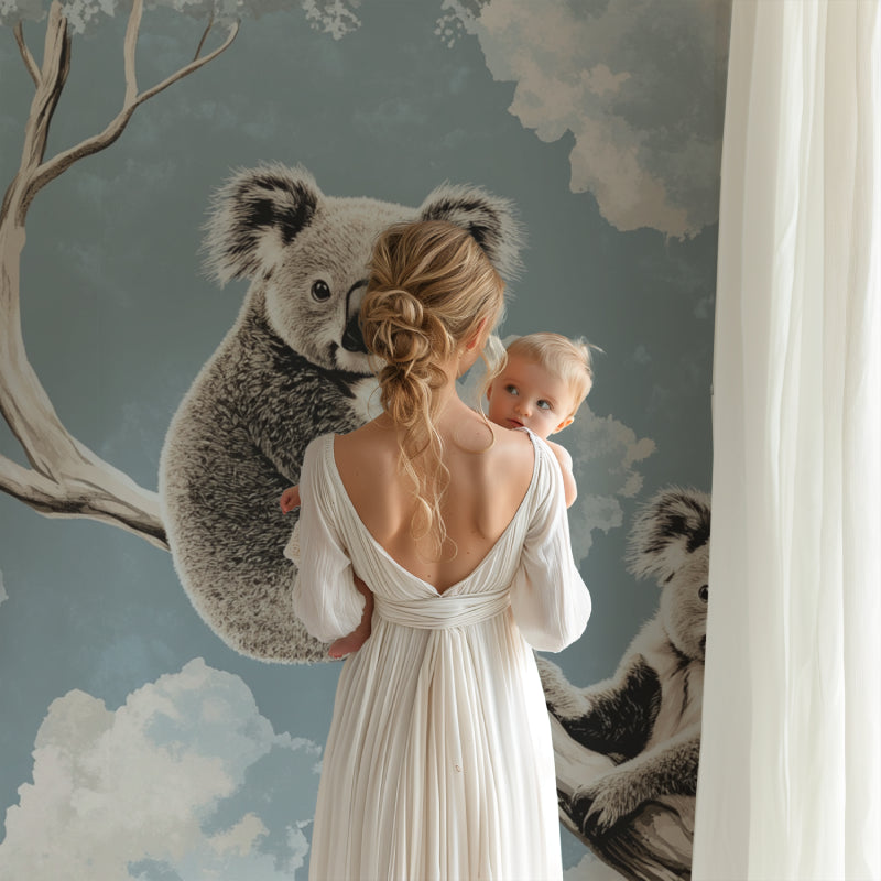 Baby room with koala mural wallpaper creating a peaceful sleep environment