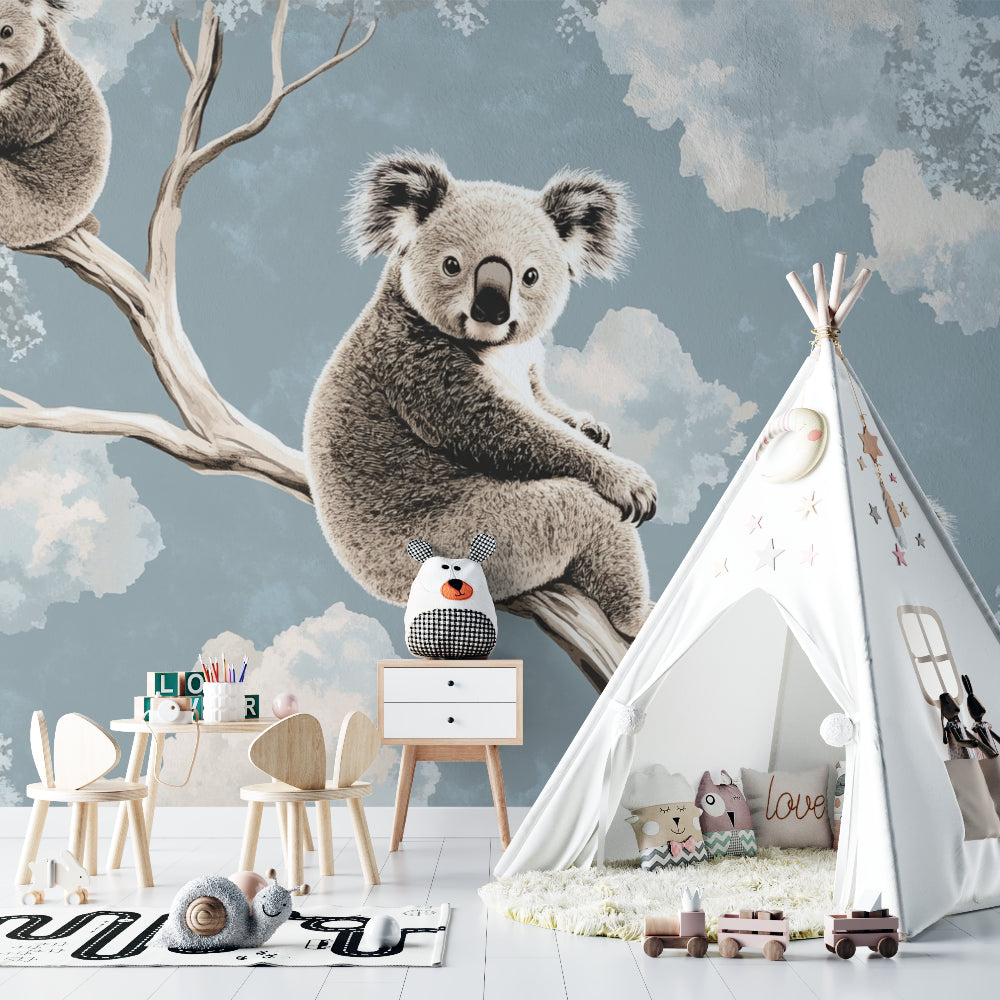Modern nursery featuring dreamy koala wall design with minimal furniture