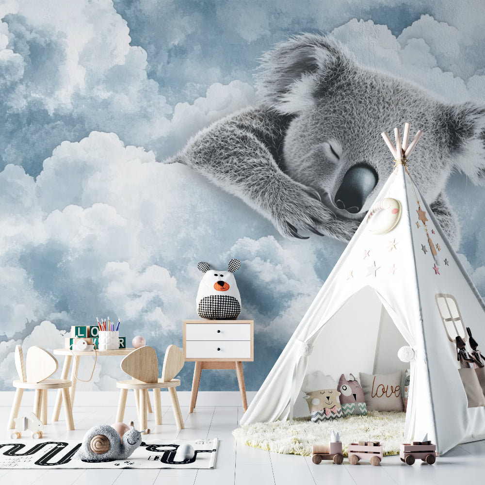 Cloud koala design in a minimalist children's bedroom with white furniture