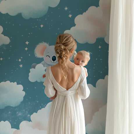 Koala wallpaper bringing magic to a modern nursery with soft cloud patterns and stars