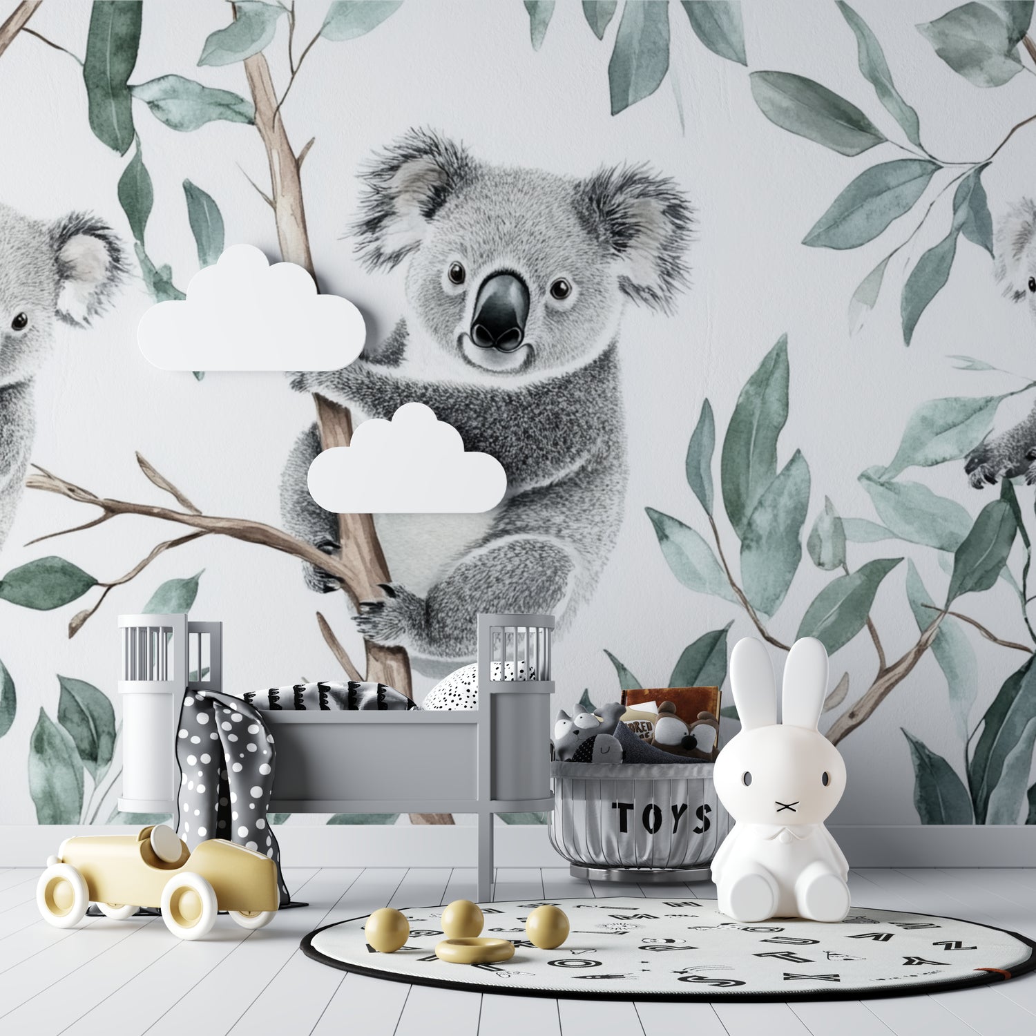 Koala wallpaper mural creating a peaceful atmosphere in a modern nursery with white furniture