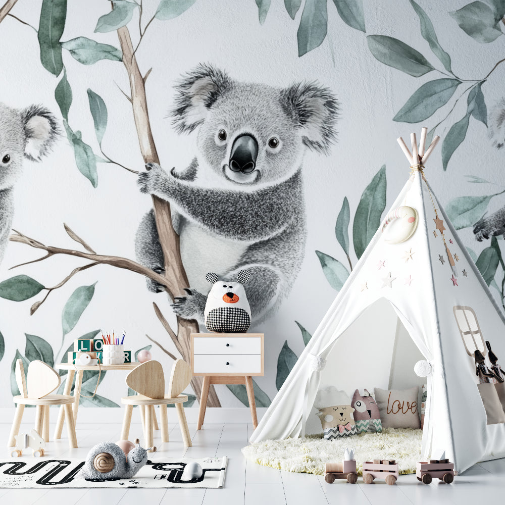 Kids bedroom featuring koala wall mural above reading nook with soft cushions