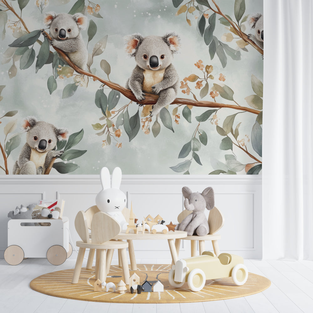 Baby room showing full wall koala mural with matching mint green and grey decor
