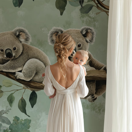 Koala wallpaper mural creating a peaceful atmosphere in a modern nursery with natural light