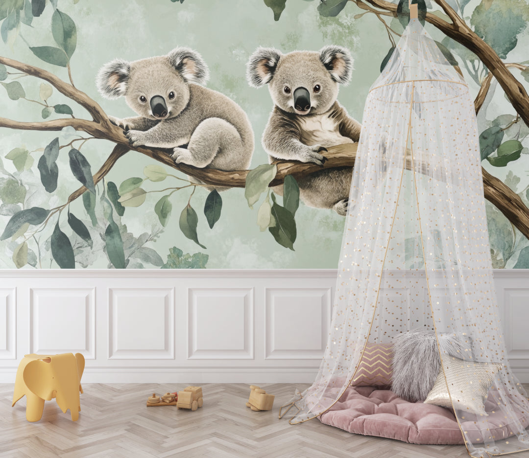 Koala nursery wallpaper displayed in a minimalist baby room with wooden furniture
