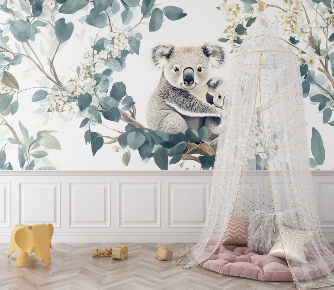 Koala wallpaper mural in a serene nursery setting with natural light and wooden furniture
