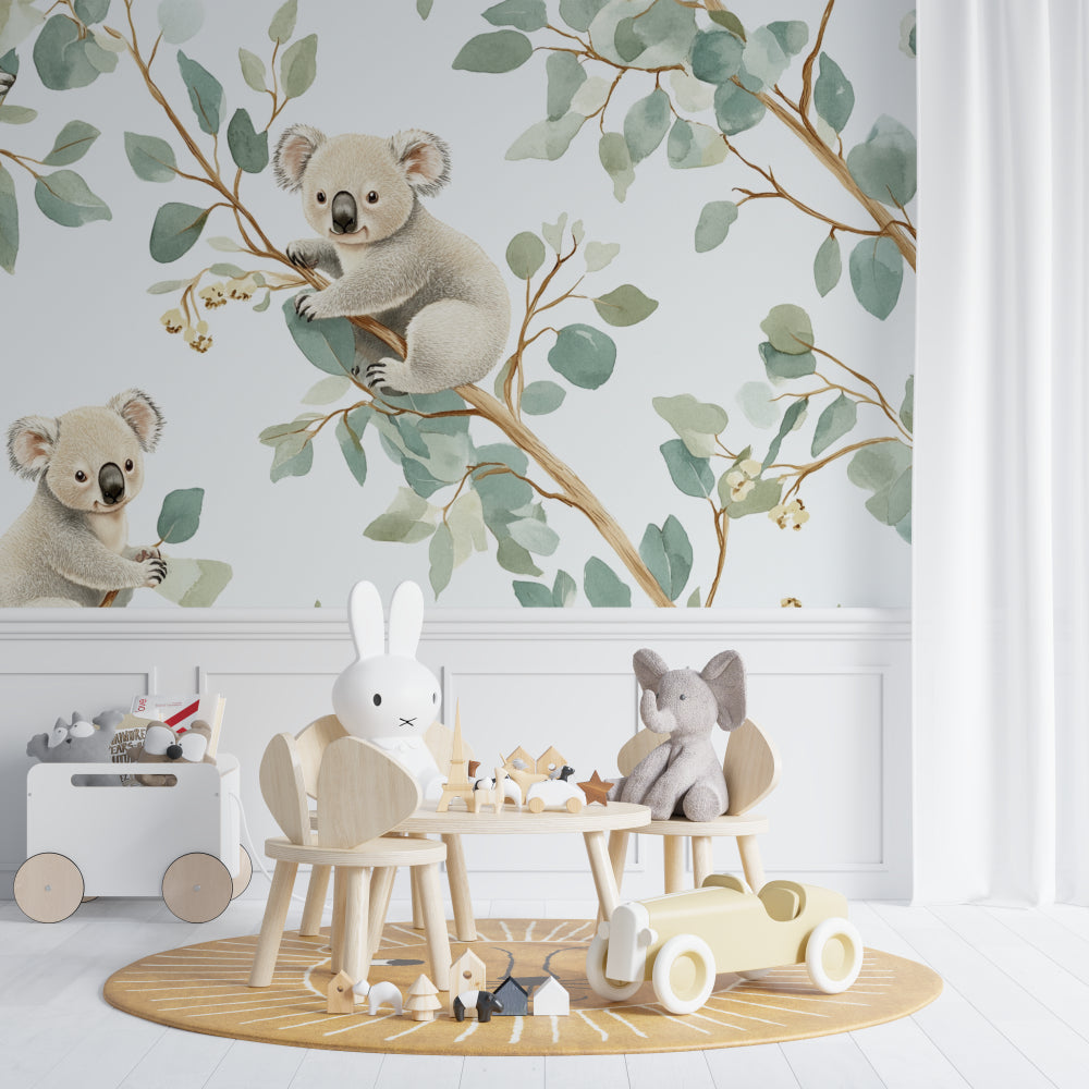 Koala and eucalyptus wallpaper in a gender-neutral nursery with minimalist decor
