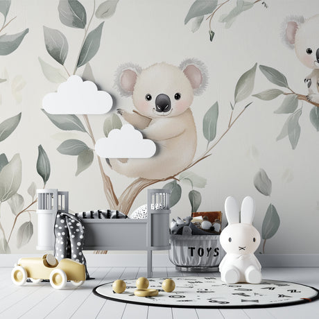 Koala wallpaper mural in a bright nursery with white furniture showing peaceful eucalyptus pattern