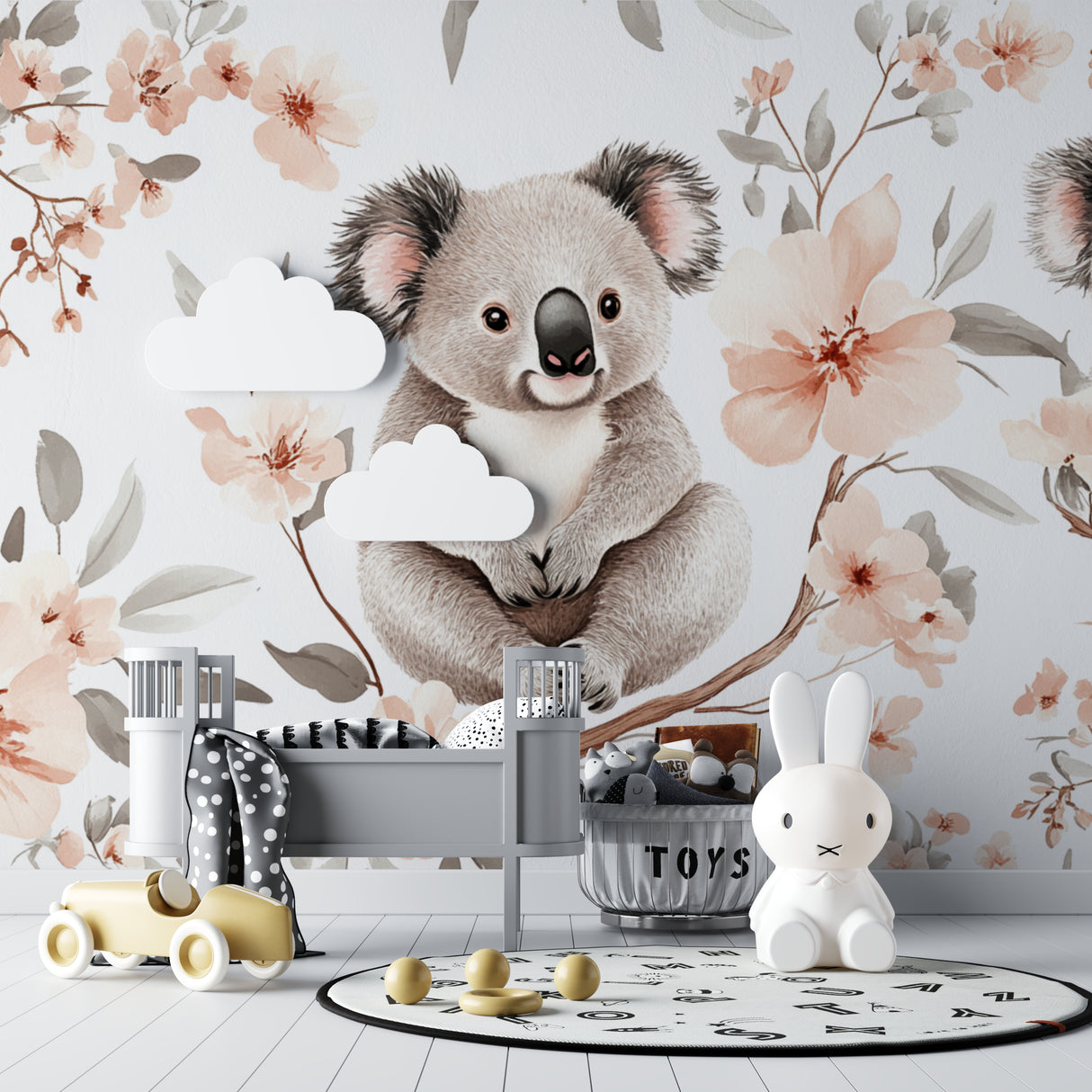 Koala wallpaper mural bringing charm to a modern nursery with white furniture and pink accents