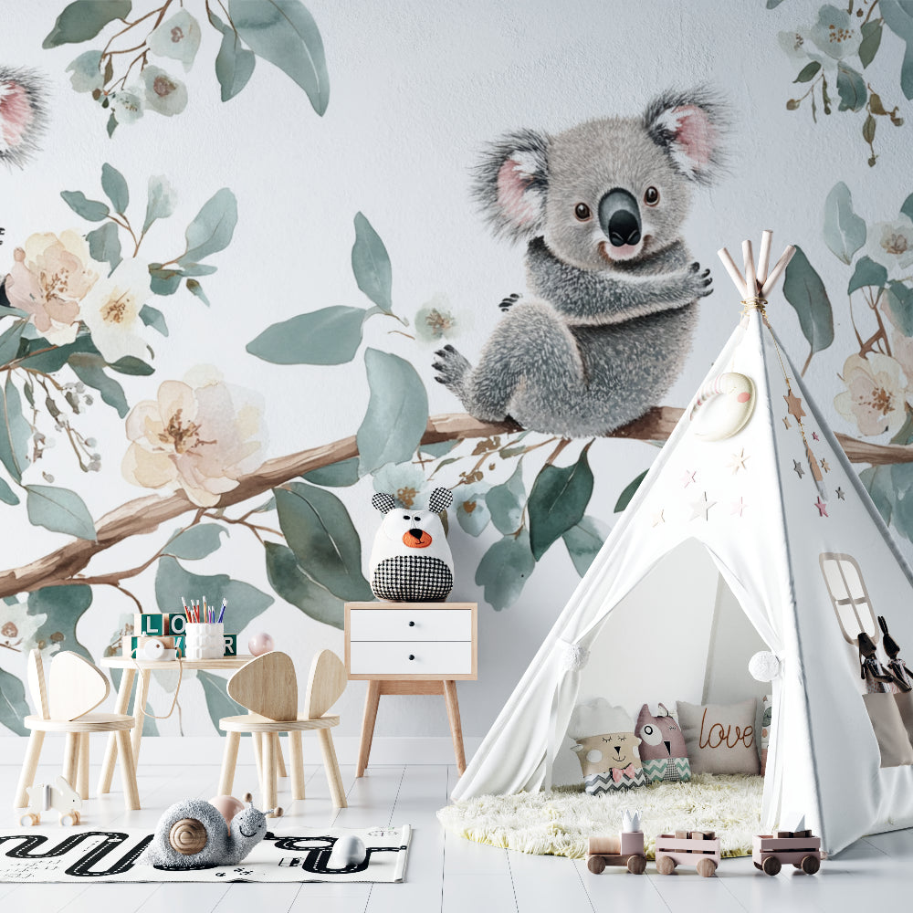 Koala nursery wallpaper mural creating a peaceful atmosphere in a modern nursery with white furniture
