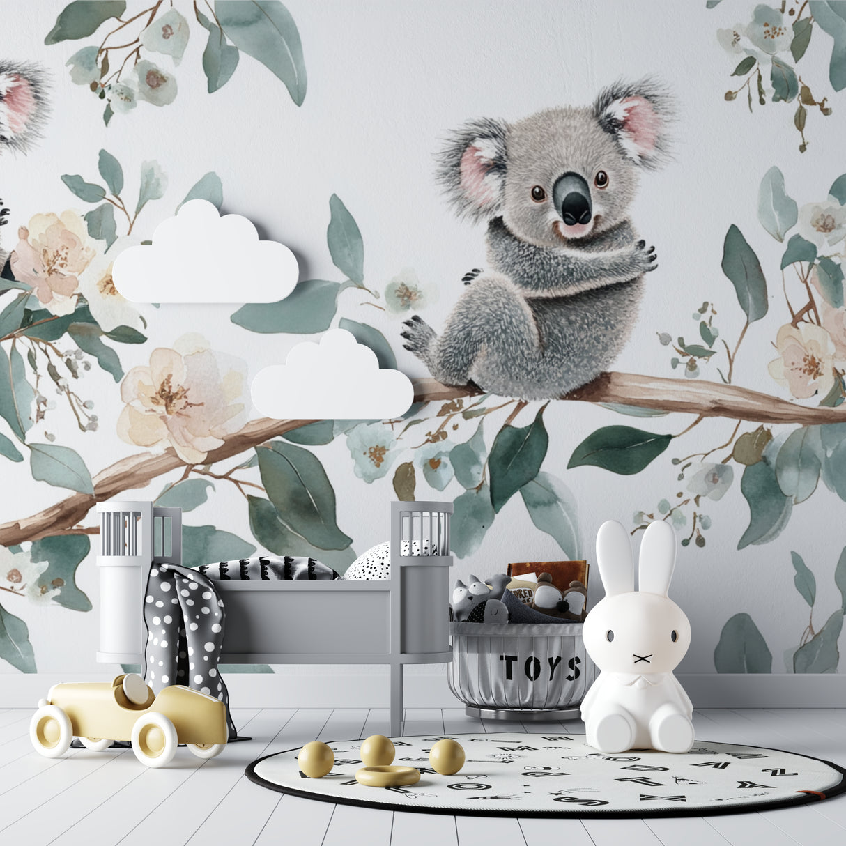 Koala and eucalyptus wall mural in a playroom with natural wood accents