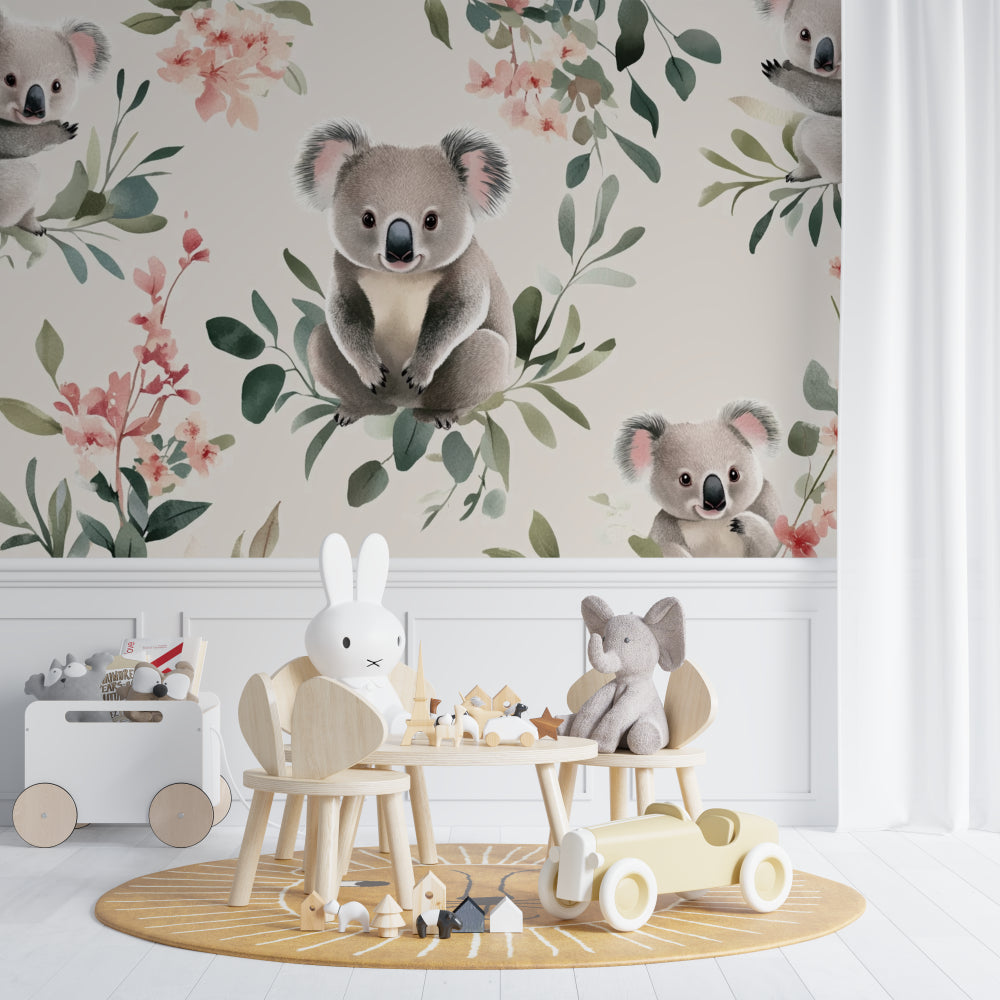 Koala nursery wallpaper mural in a bright, modern nursery with white furniture showing peaceful sleeping koalas