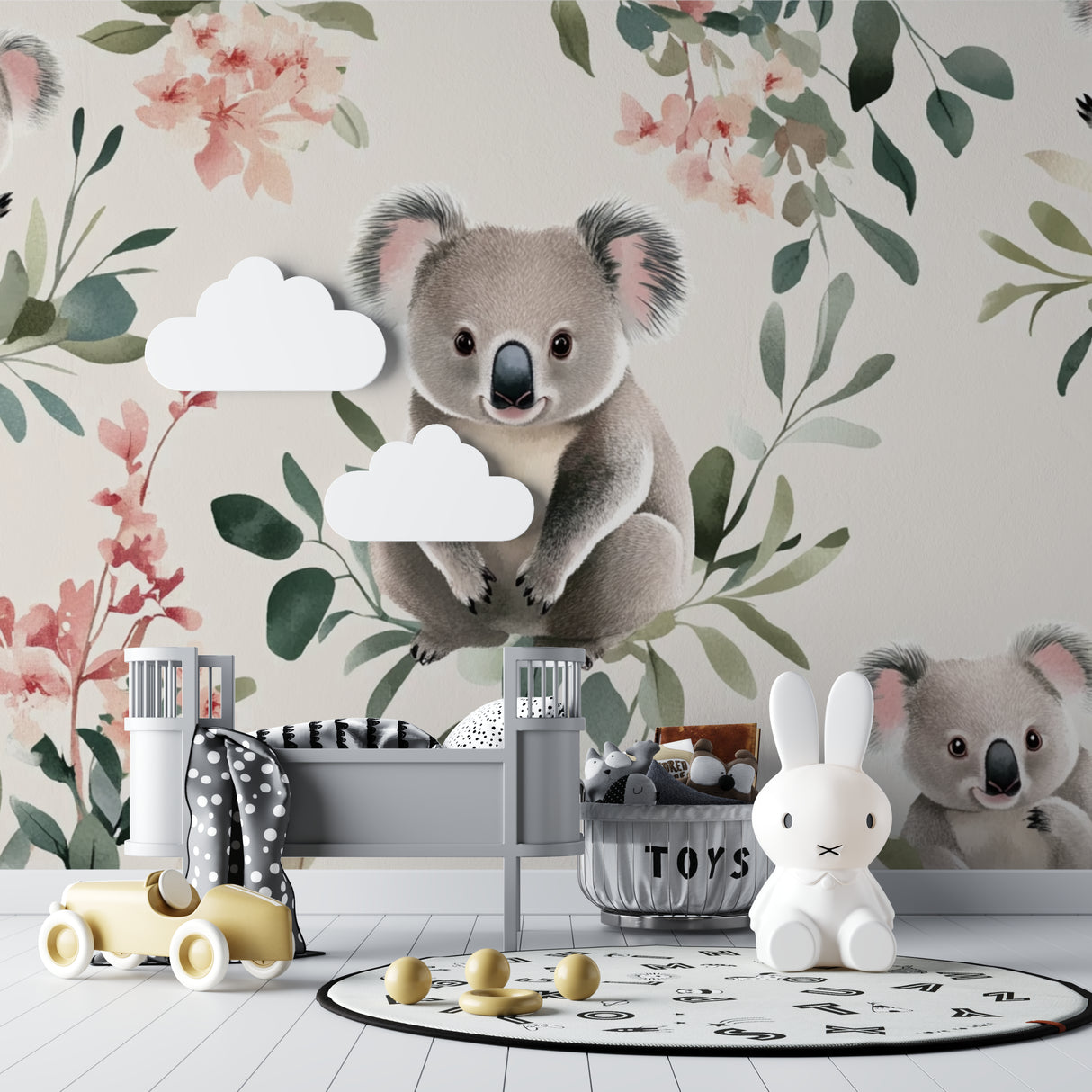 Koala wall mural featuring pink blossoms in a girl's bedroom with reading nook