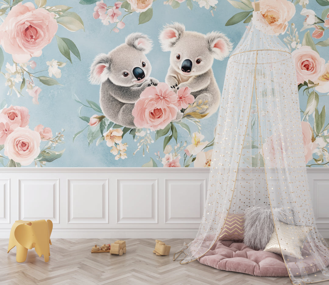 Pink floral koala mural in a bright playroom setting with soft textiles