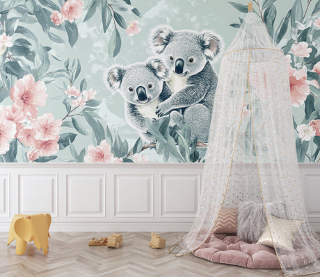 Koala nursery wallpaper creating a soft, dreamy atmosphere in a modern baby room with pink and sage accents