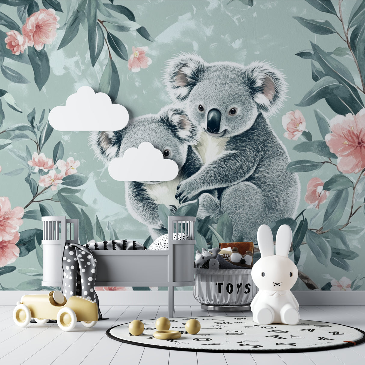 Floral koala wallpaper making a playroom feel magical with gentle pink and green tones