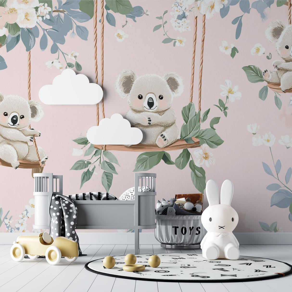 Koala nursery wallpaper bringing charm to a modern nursery with soft pink walls and natural wood furniture