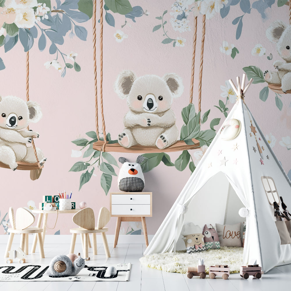 Kids room featuring koala wallpaper mural with matching white bedding and pastel accessories
