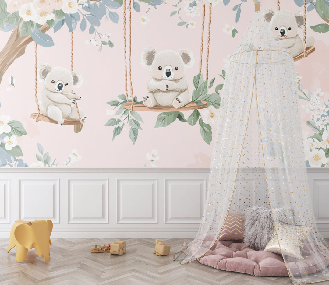 Baby room with koala wall mural creating a soft, dreamy atmosphere with matching decor