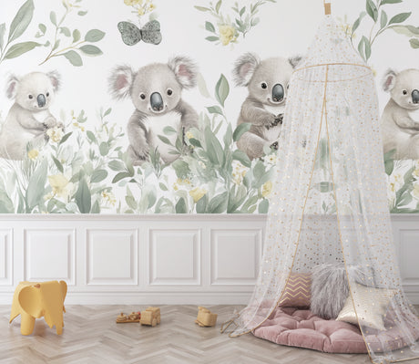 Koala nursery wallpaper creating a peaceful atmosphere in a modern white nursery with natural wood furniture
