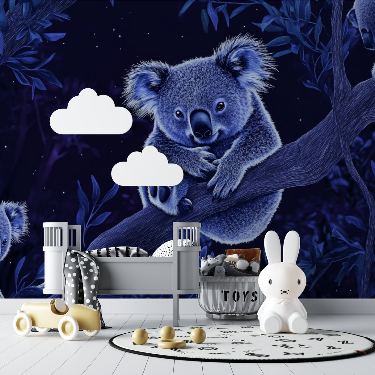 Children's bedroom featuring koala night sky wallpaper with soft blue tones and twinkling stars
