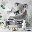 Koala wallpaper mural bringing natural charm to a modern nursery with soft grey and botanical accents