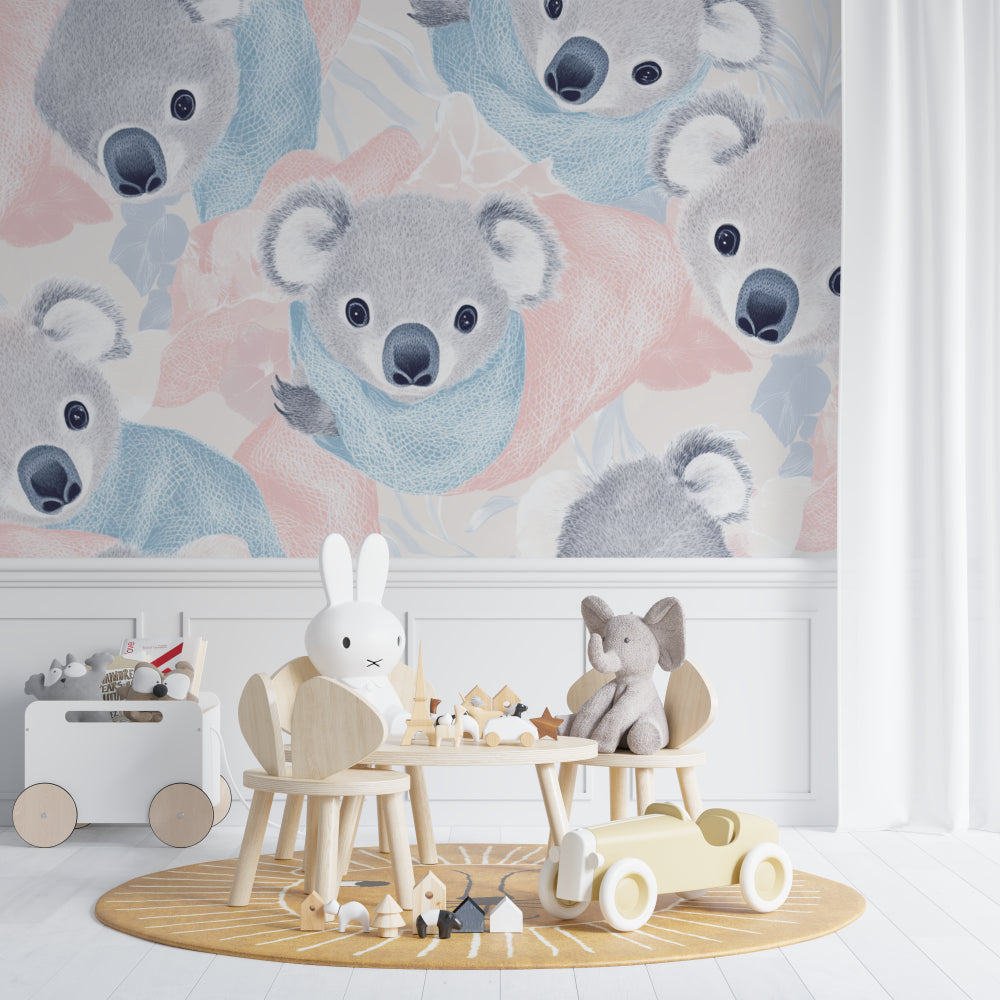 Pastel koala wall mural in neutral nursery with changing table