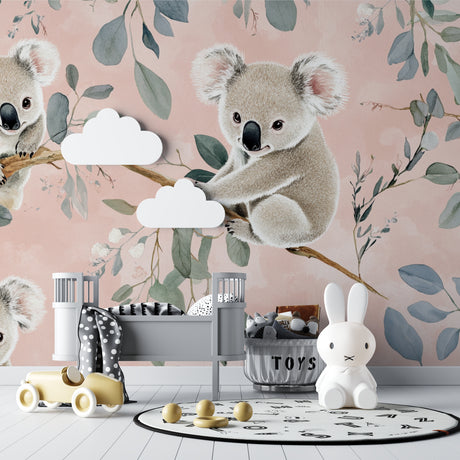 Koala wallpaper mural creating a peaceful atmosphere in a modern nursery with white furniture