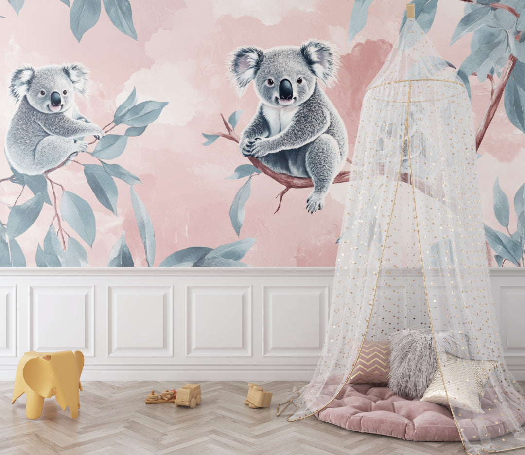 Pink koala wall mural brightening a toddler's reading nook with soft cushions
