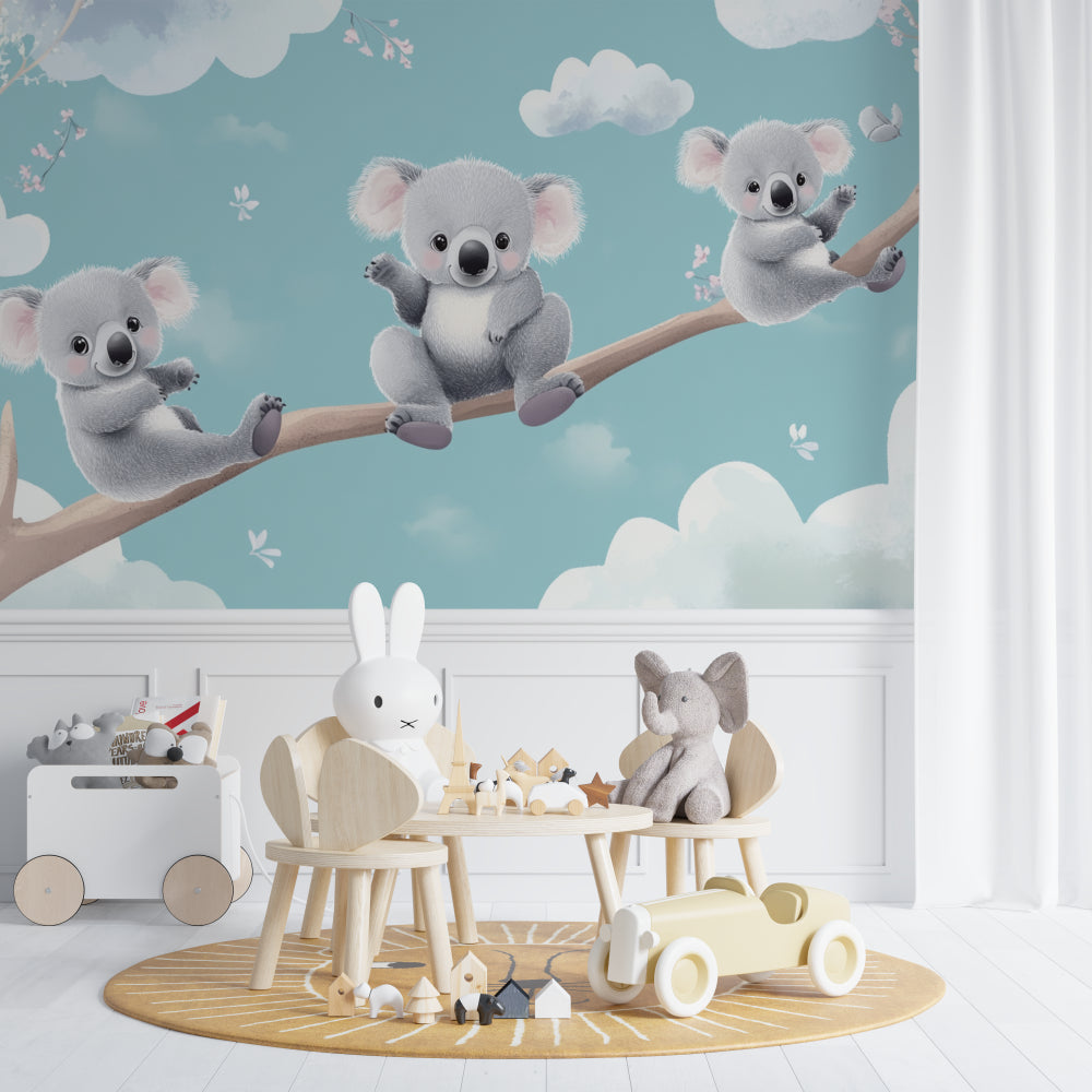 Koala wallpaper in modern nursery with white furniture and soft lighting shows peaceful sleeping atmosphere