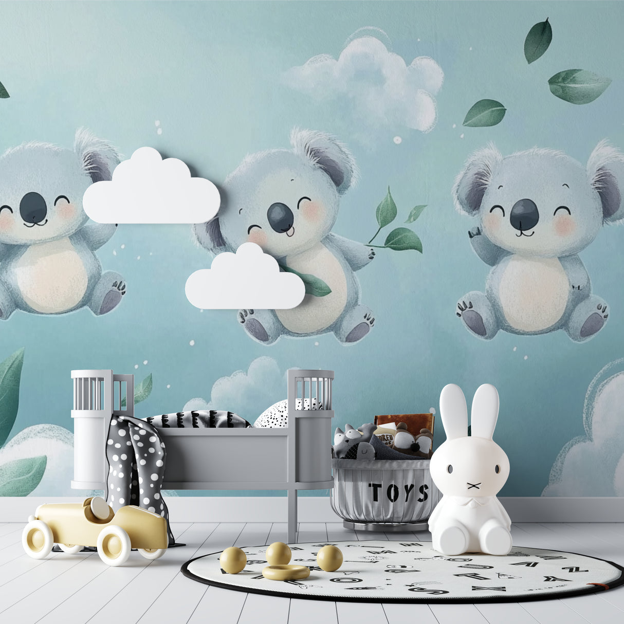 Dreamy koala mural in a mint-themed nursery with wooden accents