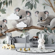 Koala wallpaper mural creating a peaceful atmosphere in a modern nursery with white furniture