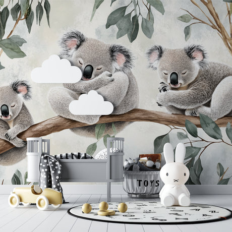 Koala wallpaper mural creating a peaceful atmosphere in a modern nursery with white furniture