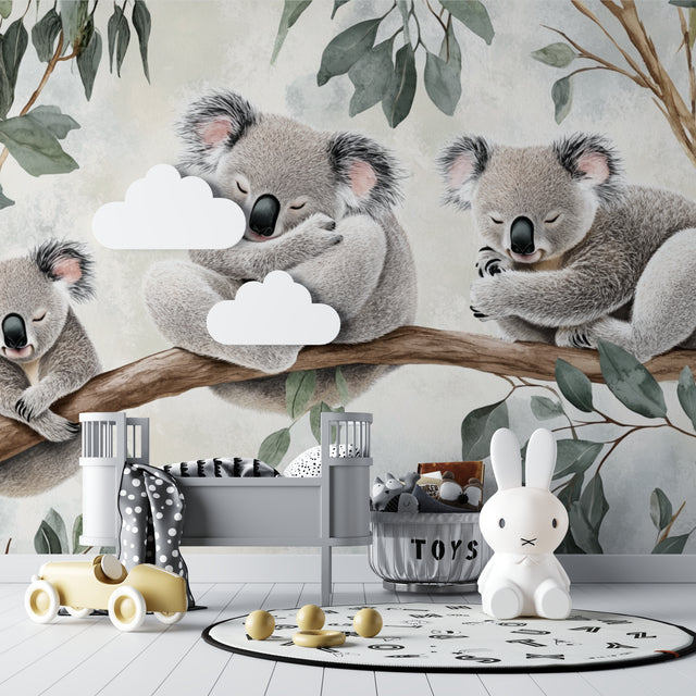 Koala wallpaper mural creating a peaceful atmosphere in a modern nursery with white furniture