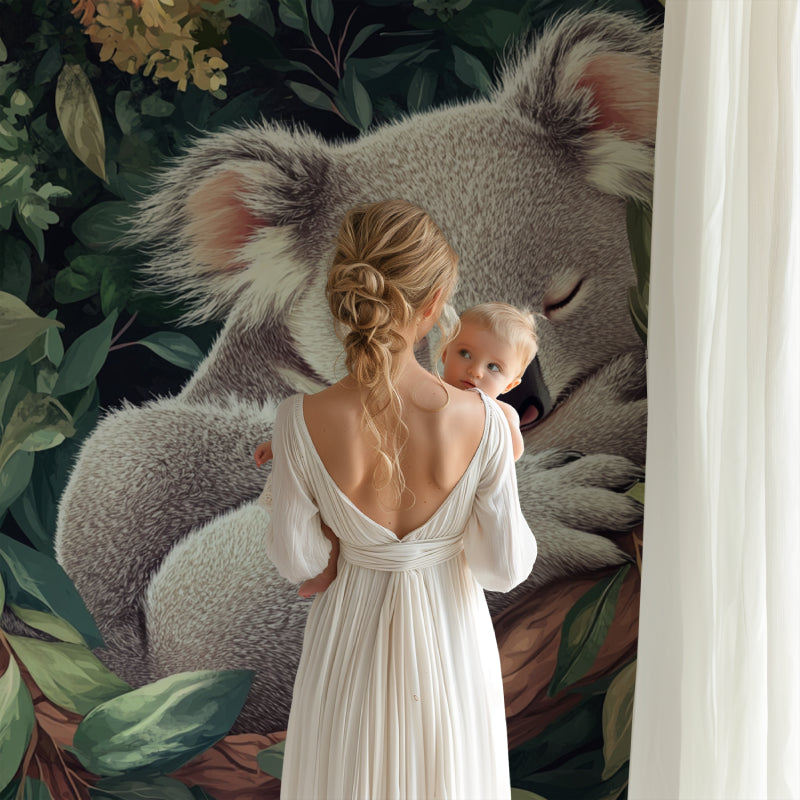 Koala mural wallpaper adding warmth to a baby's sleep space